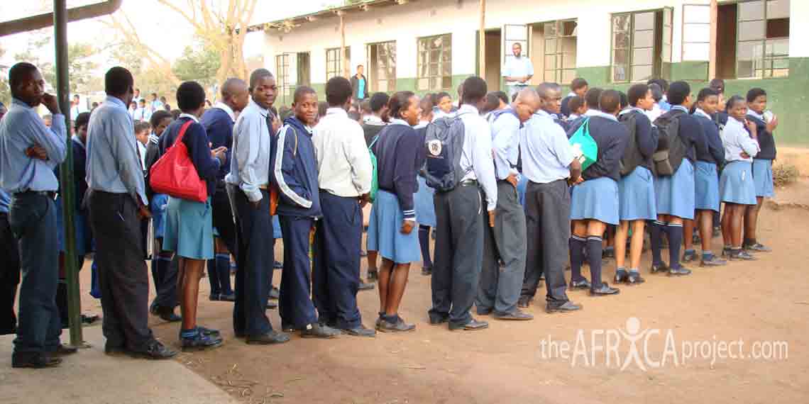 Velangaye students line up before class